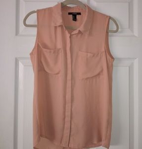 Peach sleeveless collared top